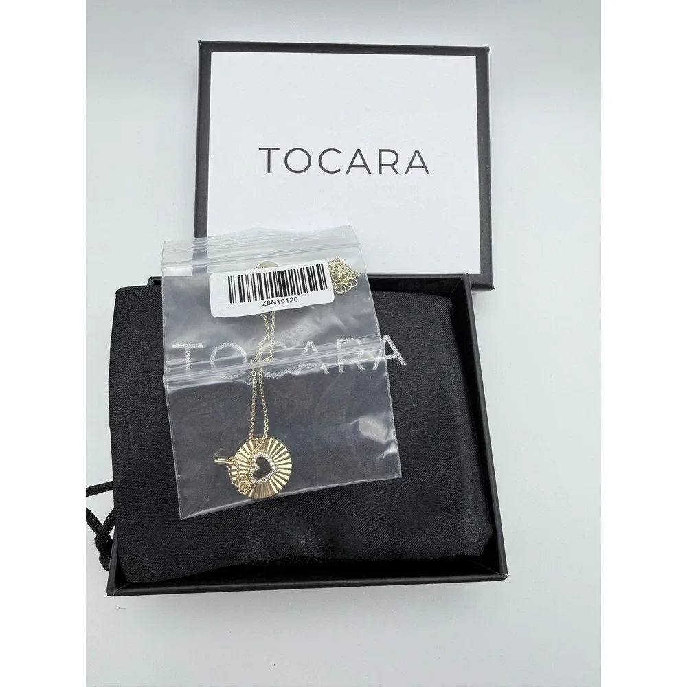 Tocara Gold Tone Sunburst Medallion Pave Crystal Heart Kim Necklace